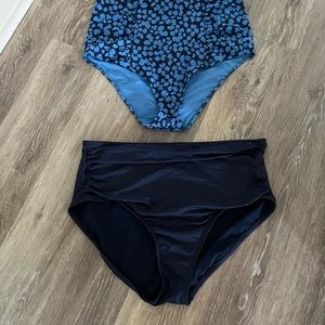 Aerie swim bottoms in navy and multi colored blues.